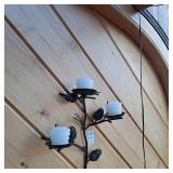 Rustic bronze or metal pinecone and branch wall