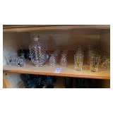 Shelf Lot of Tourist Shot Glasses