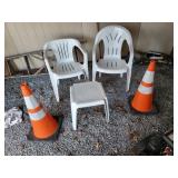 2 plastic chairs & road cones