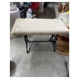 Iron bench with cushion
