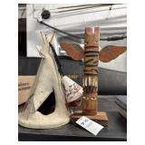Teepee and totem pole