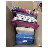 Notebooks and pens/markers