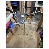 Folding music stand and flute wrist band