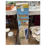 Folding clothes rack new in box