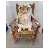 Wooden Childs rocking chair and vintage doll