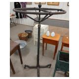 Antique rotating brass and iron clothing rack