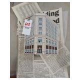 Cats Meow Swank building and newspaper clippings