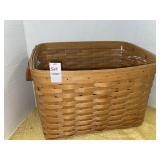 Longaberger Newspaper Basket with a clear plastic