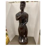 hand-carved wooden African figure of a man