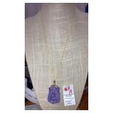 Sterling silver carved purple jade pendant