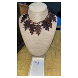 Carved wooden leaves necklace with plastic chain