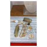 Money clip, tie bar, pocket knife, charm, pins