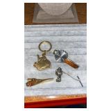 Tie bars, Smoky  the Bear Tie Tac and Red Bull