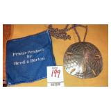 Pewter sand dollar pendant by Reed & Barton