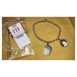 Silvertone charm bracelet w/silhouette & photo