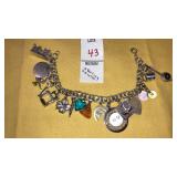 Sterling double link charm bracelet w/17 charms -