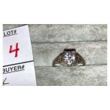 18k ring w/ gemstone- back is cut