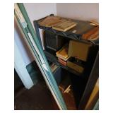 Shelf lot.  All 3 shelves, typewriters, projector