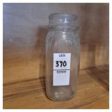 Menzie glass bottle half pint