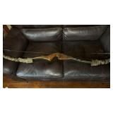 Fred Bear recurve bow with cammo sleeves