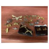 Various Army component uniform pins