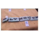 Plymouth car badge