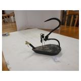 Antique swivel Betty oil lamp