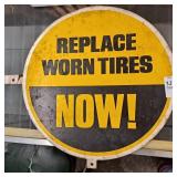 circular sign REPLACE WORN TIRES NOW