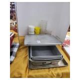 Baking dishes and plastic drinking glasses