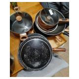 T-FAL set and misc pans and lids