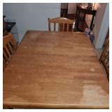 Wooden table with extra board and 4 chairs