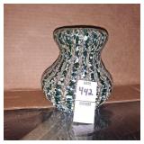 Hand-blown art glass vase with a green, blue, and