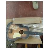 Lot with guitar (as is), box of model rocket