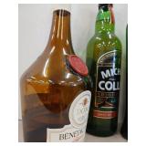 Huge variety of partial bottles with wine crate