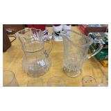 Assortment of Glass Pitchers and Glasses