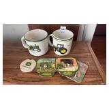 Two John Deere Coffee Mugs and Coasters