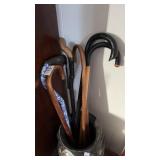 Lot of Canes in Milk Can