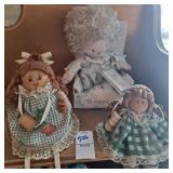 Three doll decorations