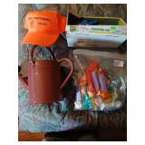 Pez lot, toy car, hat, watering can lot