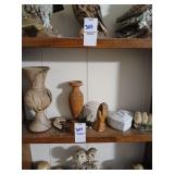 Shelf lot of trinkets, wooden vases, owls etc.