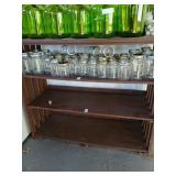 Shelf lot of pint and quart mason jars around 50
