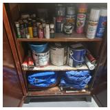 Assorted paints and tarps