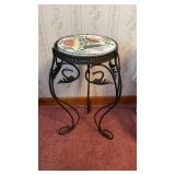 Vintage wrought iron pedestal with a ceramic