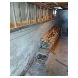 Lot of wood on floor and on wall above