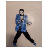 Elvis battery op. Pendulum wall clock