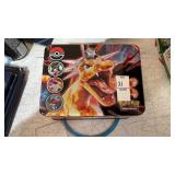 Charizard Lunchbox with Pokemon Cards, some