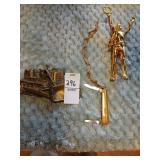 Belt buckle, necklace with pen knife etc