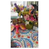 Flower arrangements, watering can, planters and