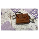 Crucifix, Leather Purse and More