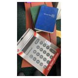 Radio Shack giant calculator and two hymnals